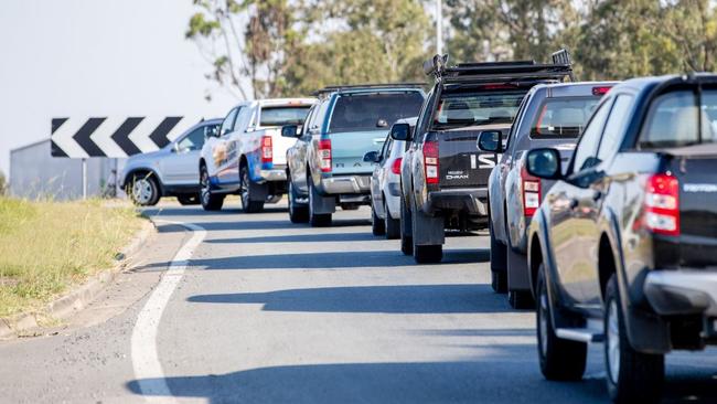 Traffic attempting to enter roundabouts at the Pacific Motorway at Pimpama north of the Gold Coast.