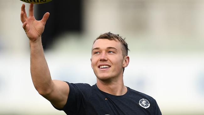 Carlton captain Patrick Cripps was well below his best against GWS, copping close attention from Matt De Boer. Picture: Quinn Rooney/Getty Images.