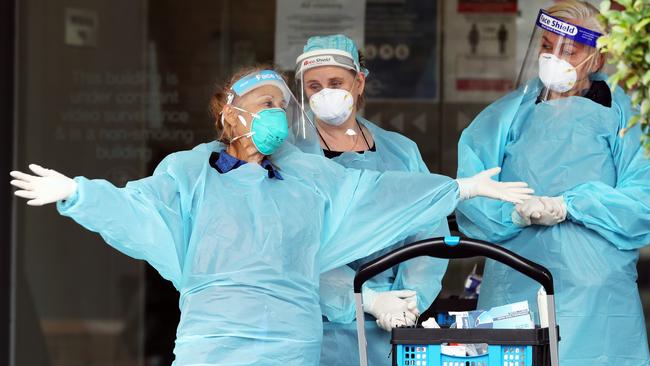 A Covid testing team arrives at the Arcare aged-care facility in Maidstone, in Melbourne’s northwest, on Monday. Picture: David Crosling