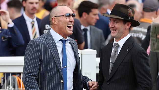 MELBOURNE , AUSTRALIA. October 21, 2023.  Caulfiled Cup Day.   Race 1. The LamarÃs Hotel Plate.  Ciaron Maher, trainer of Brave Mead with Jamie Lovett after winning the 1st  . Pic: Michael Klein