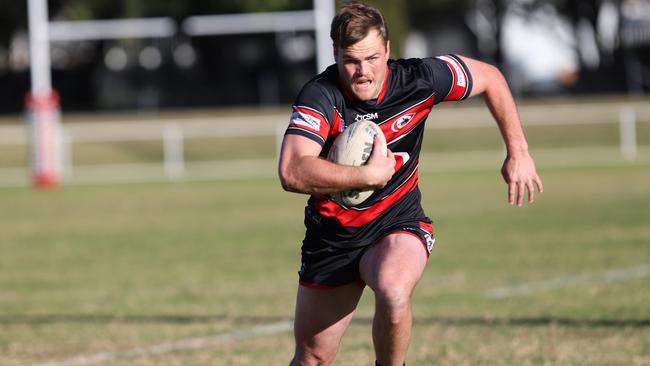 Sam McCann taking a run for Collegians. Picture: Steve Montgomery