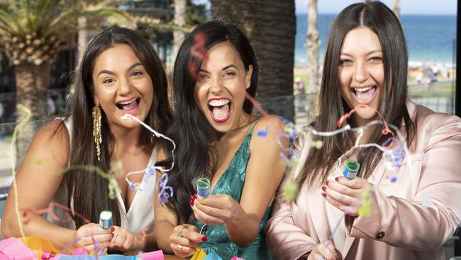 Kassie Ladas, Cassandra Momone and Mia Louca get ready to count down to 2020 at the Moseley Bar and Kitchen. Picture: AAP / Emma Brasier