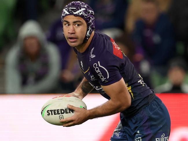 MELBOURNE, AUSTRALIA - MAY 11:  Jahrome Hughes of the Storm looks to pass the ball during the round 11 NRL match between Melbourne Storm and Brisbane Broncos at AAMI Park on May 11, 2023 in Melbourne, Australia. (Photo by Robert Cianflone/Getty Images)