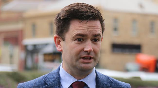 Labor's Dean Winter speaks to the media on Parliament Lawns in Hobart on Thursday, July 20, 2023.