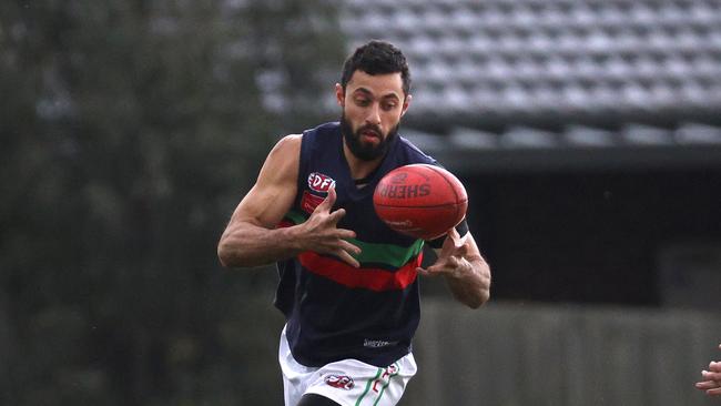 Tamer Abdallah playing coach of Northern Saints. Photo: Hamish Blair