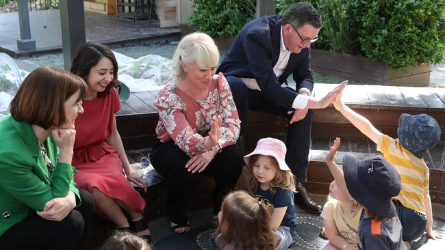 Daniel Andrews with his wife Cathrine, and Health Minister Mary-Anne Thomas make at a Northcote childcare centre. Picture: David Crosling