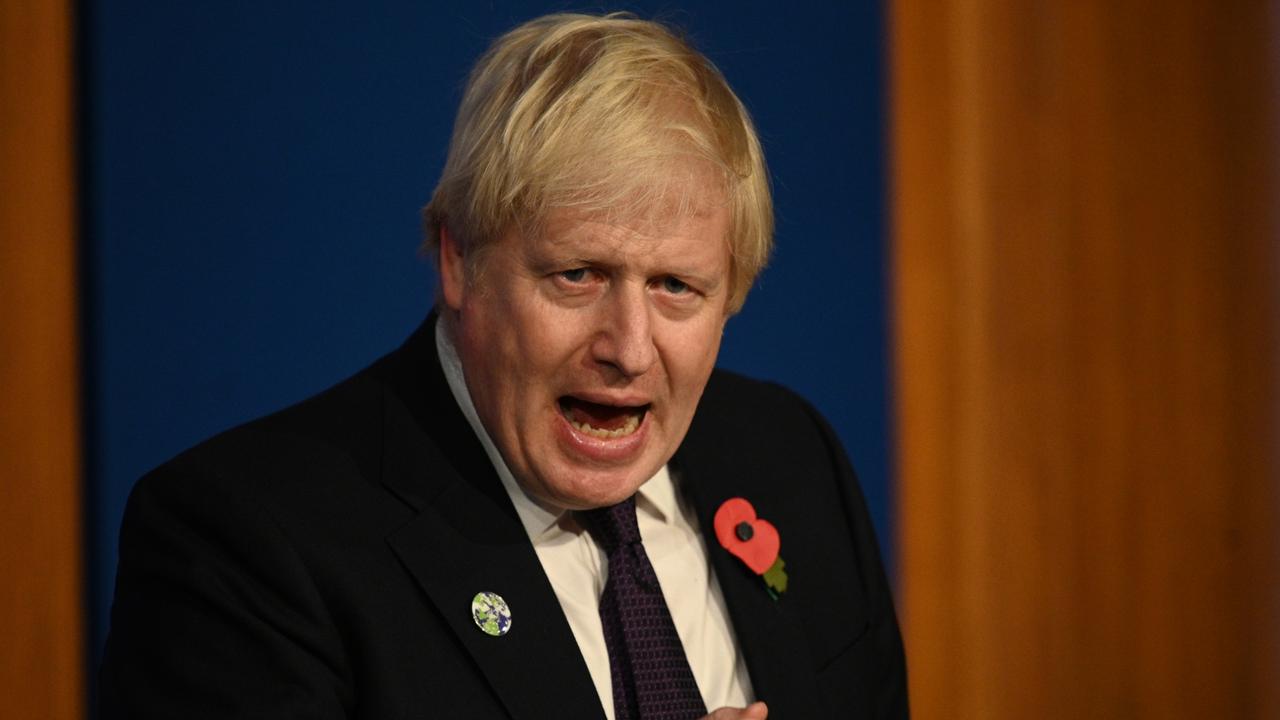 Britain's Prime Minister Boris Johnson speaks during a press conference inside the Downing Street Briefing Room in London. Picture: WPA Pool/Getty Images)