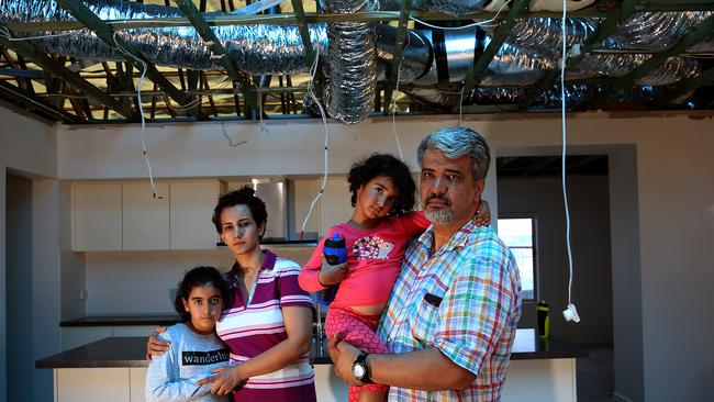 Behnoosh Khalaj, her husband Sina Mavaddati and two daughters had just moved into their dream home in Kellyville when the hail storm struck causing major damage. Picture: Carmela Roche