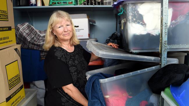 Caboolture Community Action president Sharin Geeves sorts through some of their stock. Photo Vicki Wood / Caboolture News