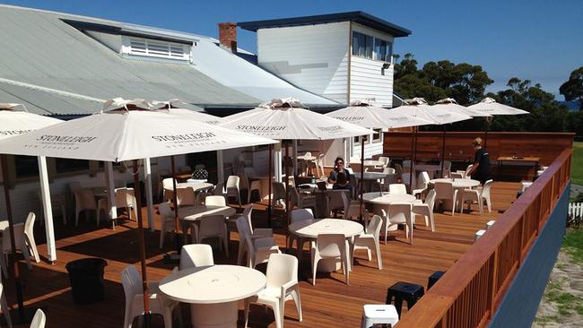 Grab a beer and enjoy the deck of the Marlo Hotel.