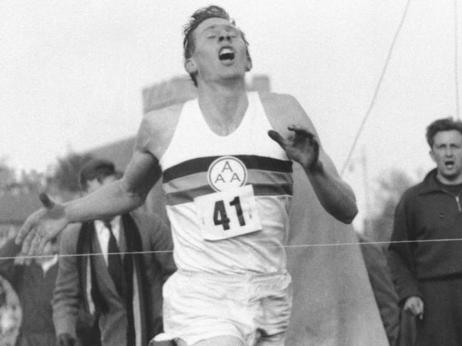 Roger Bannister hits the tape to break the four-minute mile in Oxford, England in 1954.