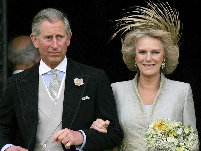 Britain's Prince Charles and his bride Camilla Duchess of Cornwall leave St George's Chapel in Windsor, England following the church blessing of their civil wedding ceremony. Picture: AP