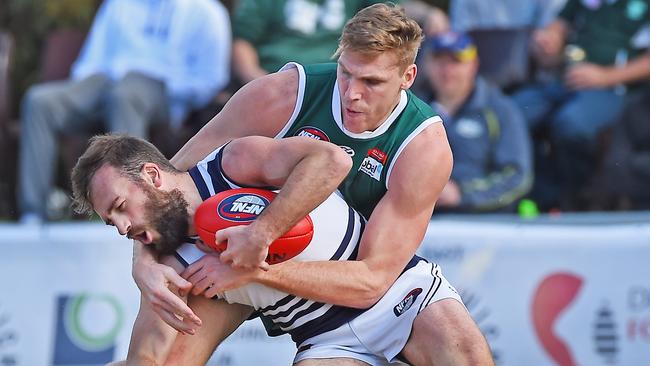 Tom Bell tackles coach Andrew Sturgess. Picture: Rob Leeson