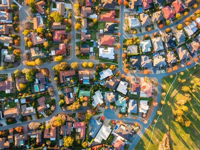 Typical Australian suburb from above in autumn; housing overhead generic