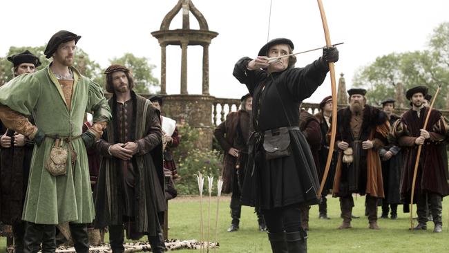 Aiming for who, exactly? … Thomas Cromwell, played by Mark Rylance, is watched at archery by Damian Lewis’ young King Henry VIII in Wolf Hall.