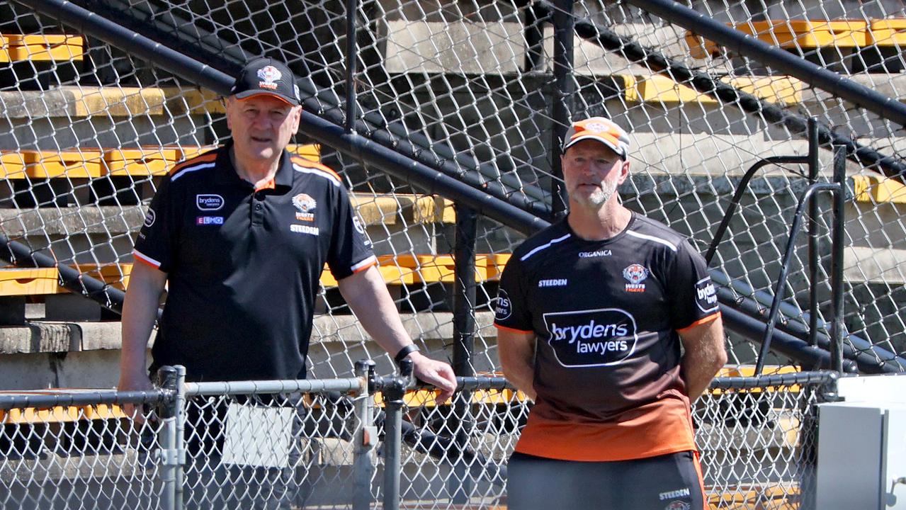 <b>Tim Sheens and coach Michael Maguire watch the Tigers squad train at Leichardt Oval. Picture: Toby Zerna</b>