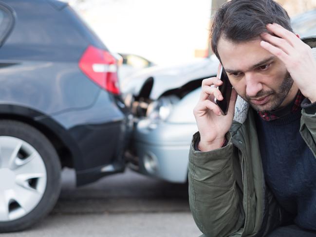 A man calling his phone insurer after having a car crash. Picture: iStock.