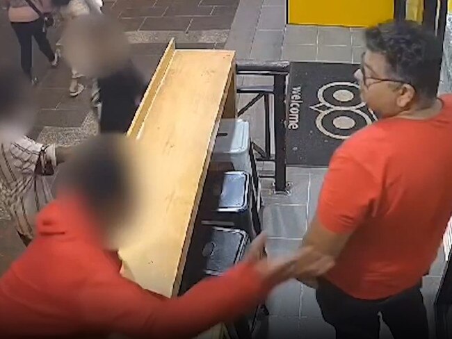 One person reaches out to touch the staff member, who then retaliates. Picture: Supplied