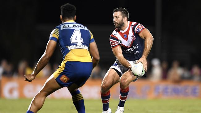 James Tedesco of the Roosters looks to pass the ball during the round 20 NRL match between the Sydney Roosters and the Parramatta Eels at BB Print Stadium, on July 29, 2021, in Mackay, Australia. Picture: Albert Perez – Getty Images