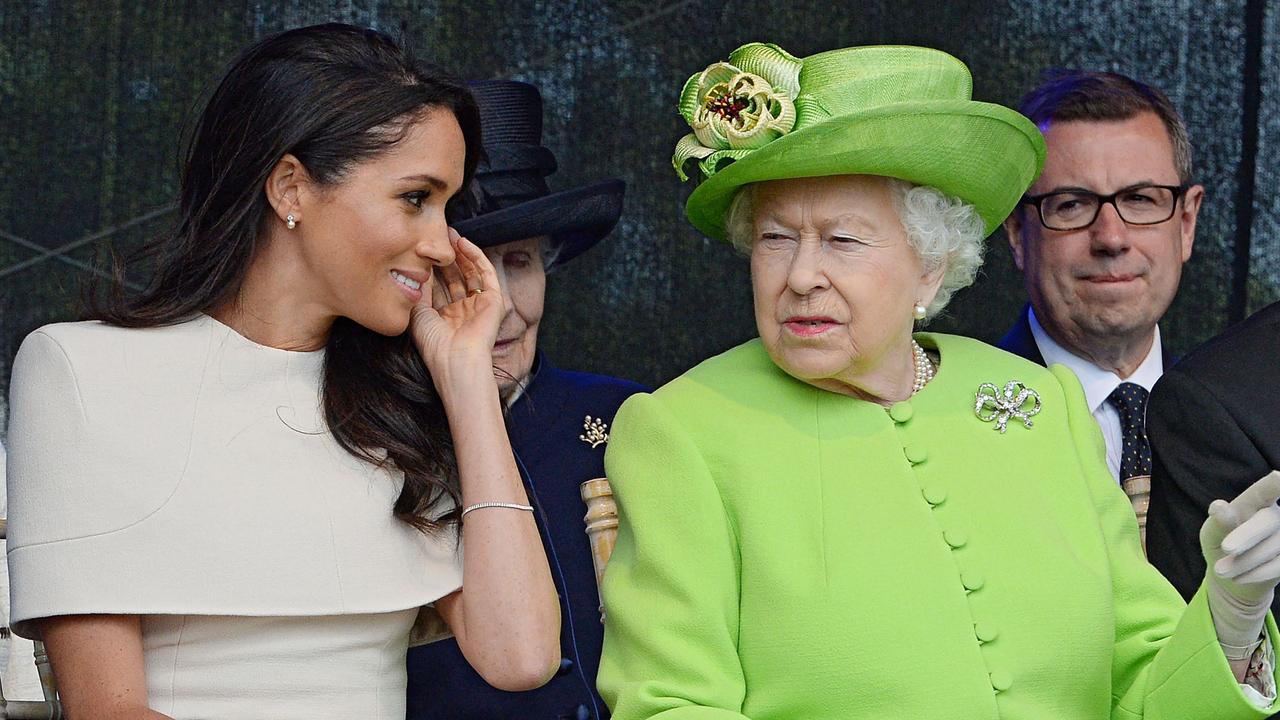 Meghan with a hatted Queen during their June 2018 engagement together. Picture: Jim Clarke/AFP