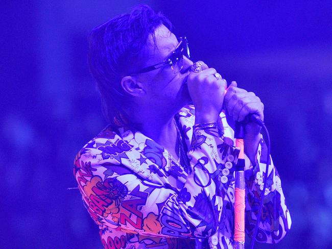 Julian Casablancas of US rock band The Strokes performs before a rally for Democratic presidential hopeful Senator Bernie Sanders (not pictured) at the University of New Hampshire in Durham, New Hampshire on February 10, 2020. (Photo by Joseph Prezioso / AFP)