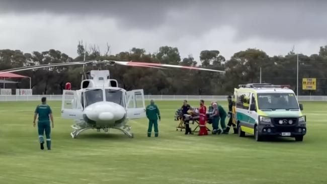 A rescue helicopter retrieves one of the police officers injured in a horrific attack at Crystal Brook. Picture: 7 NEWS