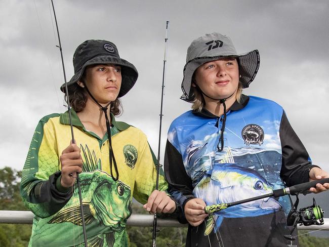 'Fishin' in the Drizzle' - Redynch College students and mates  Sebastian Hadaway (left) and Riley Bone (right - both 13)  prepare for a few hours of damp fishing at the old Stratford bridge over the Barron River. Picture: Brian Cassey