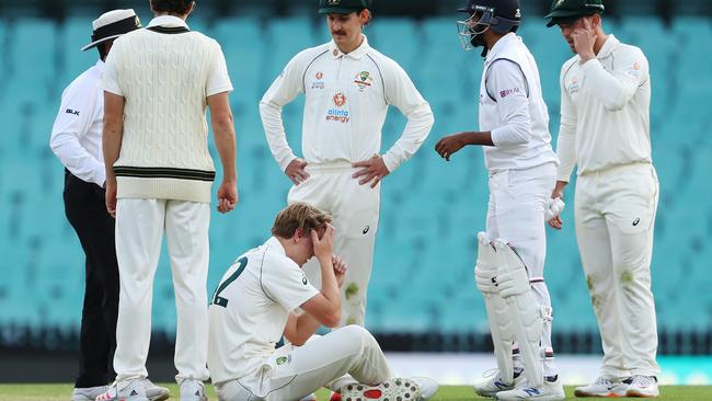 Cameron Green after being hit in the head from a shot by Jasprit Bumrah