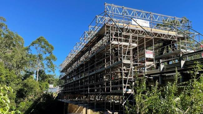 Erection of scaffolding prior to encapsulation, Glenreagh Bridge.