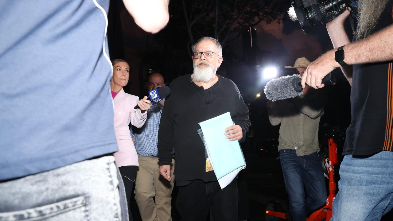 High profile lawyer Michael Bosscher leaves the Brisbane Watch House after his arrest. Picture: Lachie Millard