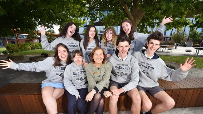 McKinnon Secondary College students Emily and Monique Andjelic, Chloe and Megan Hoffman, Emilia and Madeleine Mason and Will and Sam Kay, with principal Pitsa Binnion. Picture: Nicki Connolly