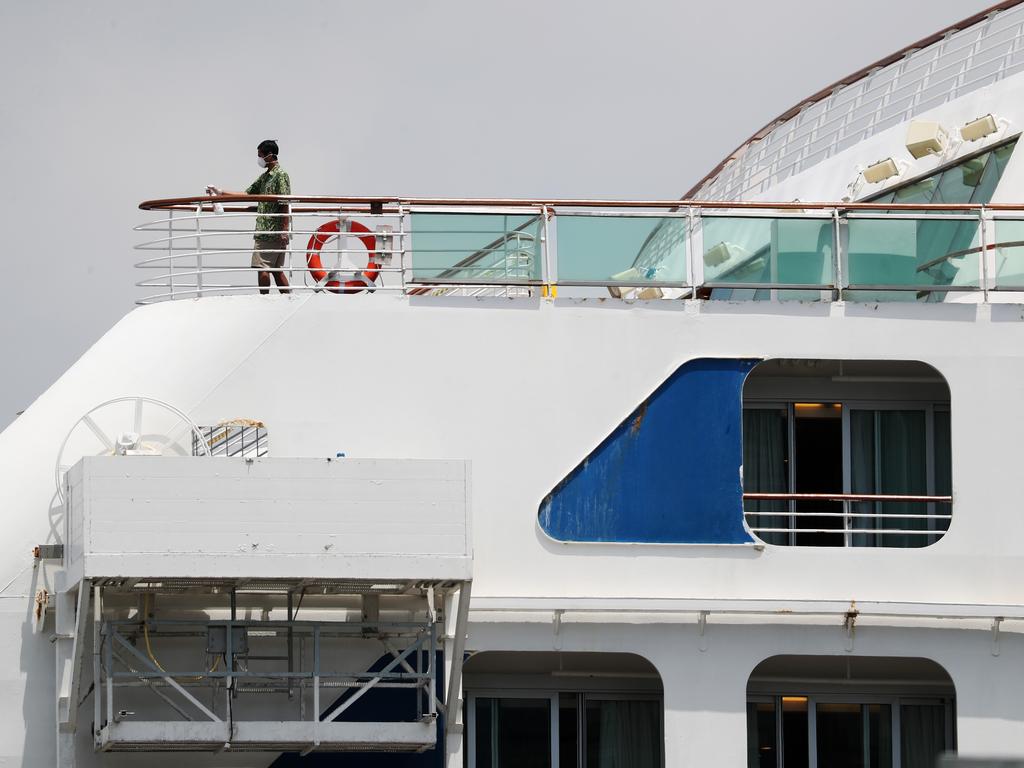 A cleaner works on the Sun Princess after an outbreak of norovirus in February 2017. Picture: Tara Croser