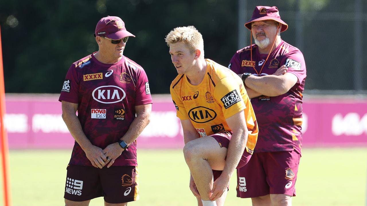 Coach Kevin Walters talks with Tom Dearden after the halfback signed with the Cowboys. Picture: Liam Kidston