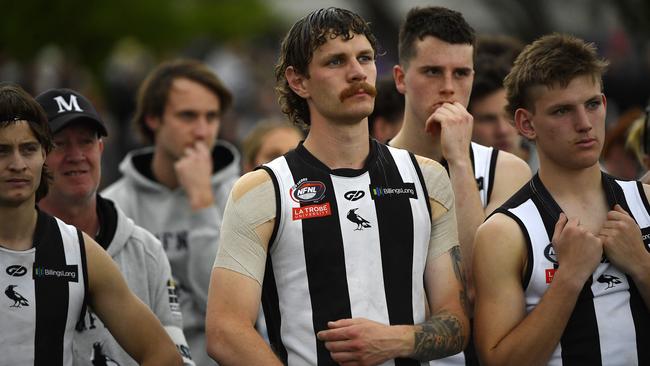 Montmorency players watch on after losing the NFNL Division 1 grand final. Picture: Andrew Batsch