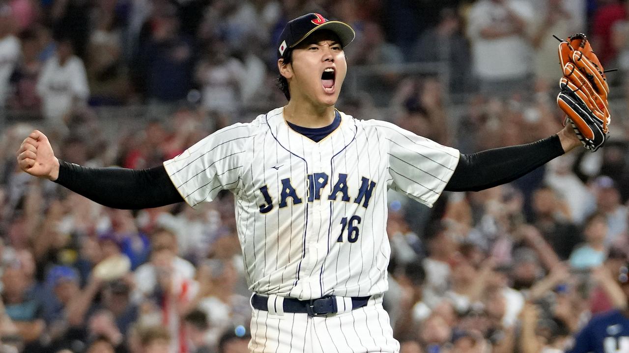 MIAMI, FLORIDA - MARCH 21: Shohei Ohtani #16 of Team Japan reacts after the final out of the World Baseball Classic Championship defeating Team USA 3-2 at loanDepot park on March 21, 2023 in Miami, Florida. (Photo by Eric Espada/Getty Images)