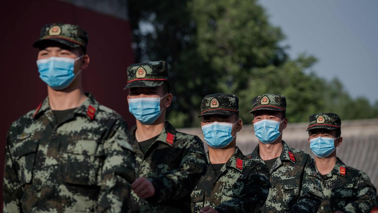 China’s state media has warned that the “battle is on” with the United States. (Photo by NICOLAS ASFOURI / AFP)