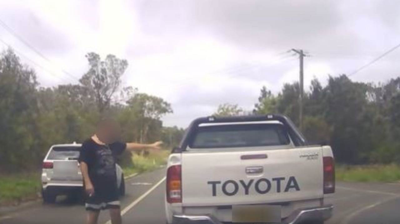 The man appeared to wave off the ute, driven by the woman’s brother. Picture: Facebook/ Dash Cam Owners Australia