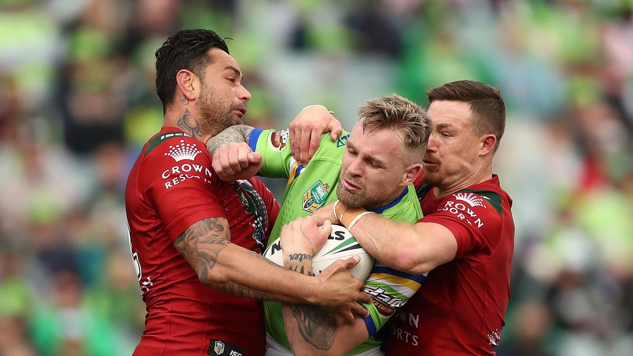 CANBERRA, AUSTRALIA - AUGUST 25: Blake Austin of the Raiders is tackled during the round 24 NRL match between the Canberra Raiders and the South Sydney Rabbitohs at GIO Stadium on August 25, 2018 in Canberra, Australia. (Photo by Mark Metcalfe/Getty Images)