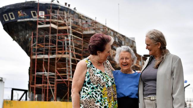 Pam Whittle and her daughters Julia Whittle and Meredith Reardon watch as the historic clipper ship 'City of Adelaide' is moved. Picture: Bianca De Marchi