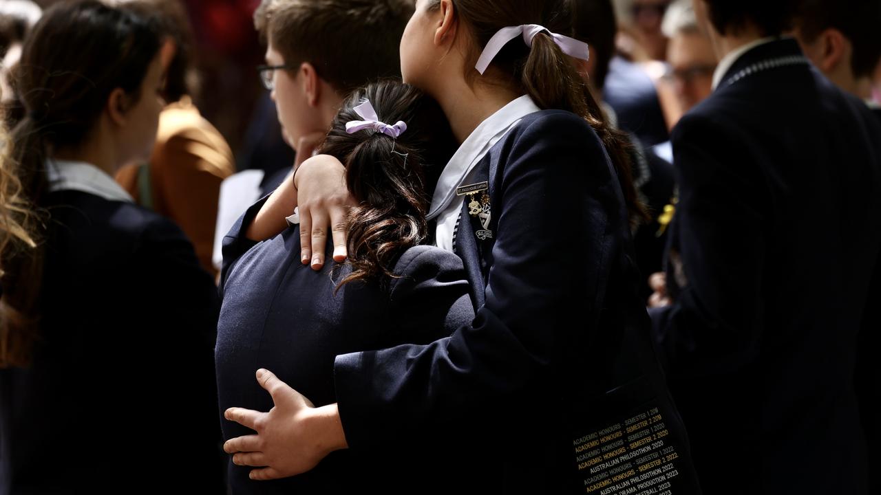 Students were embracing each other after the service. Picture: NCA NewsWire/ Dylan Robinson