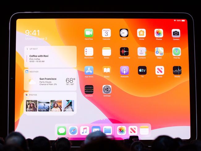 Apple CEO Tim Cook presents the keynote address during Apple's Worldwide Developer Conference (WWDC) in San Jose, California on June 3, 2019. (Photo by Brittany Hosea-Small / AFP)