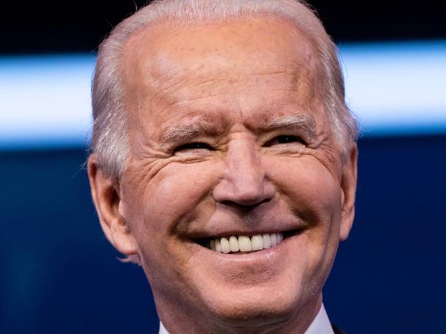 (FILES) In this file photo taken on December 22, 2020 US President-Elect Joe Biden  delivers remarks, before the holiday, at The Queen in Wilmington, Delaware. - Consumed by election conspiracy theories, abandoned by allies, and having all but shelved official duties, Donald Trump leaves on December 23, 2020 for his last Christmas holiday as president in a decidedly un-merry mood. (Photo by Alex Edelman / AFP)