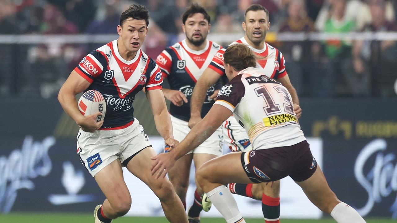 LAS VEGAS, NEVADA - MARCH 02: JosephÃ&#130;Â Manu of the Roosters runs the ball during the round one NRL match between Sydney Roosters and Brisbane Broncos at Allegiant Stadium, on March 02, 2024, in Las Vegas, Nevada. (Photo by Ezra Shaw/Getty Images)