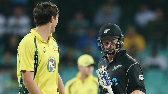 Pat Cummins has a giggle after breaking Colin Munro’s bat.