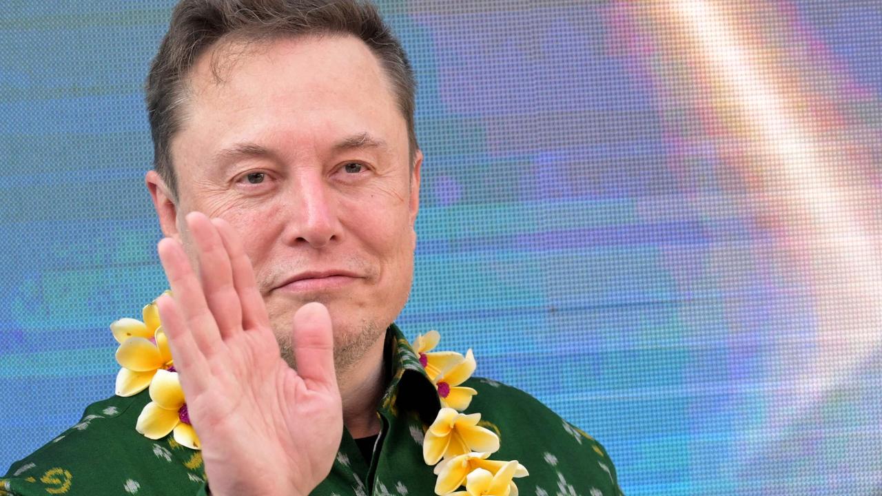 Tech billionaire Elon Musk gestures after signing documents before inaugurating satellite unit Starlink at a community health center in Denpasar on Indonesia's resort island of Bali on May 19, 2024. Musk launched on May 19 his Starlink service on Indonesia's resort island of Bali as the country aims to extend internet to its remote areas. Millions of people in Indonesia, a vast archipelago of more than 17,000 islands, are not currently hooked up to reliable internet services. (Photo by SONNY TUMBELAKA / AFP)