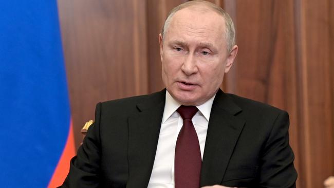 MOSCOW, RUSSIA - FEBRUARY 21, 2022: Russia's President Vladimir Putin addresses the nation on the recognition of independence of the Donetsk and Lugansk People's Republics. Alexei Nikolsky/Russian Presidential Press and Information Office/TASS (Photo by Alexei Nikolsky\\TASS via Getty Images)