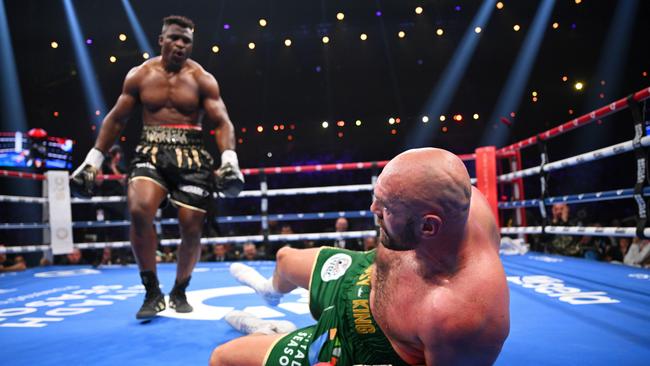 RIYADH, SAUDI ARABIA - OCTOBER 28: Francis Ngannou knocks down Tyson Fury during the Heavyweight fight between Tyson Fury and Francis Ngannou at Boulevard Hall on October 28, 2023 in Riyadh, Saudi Arabia. (Photo by Justin Setterfield/Getty Images)