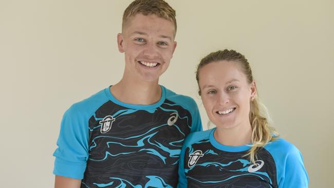 Star SA athletes and parkrunners Isaac Heyne and Caitlin Adams after winning the Burnie Tasmania 10km race last year. Picture: Roy VanDerVegt