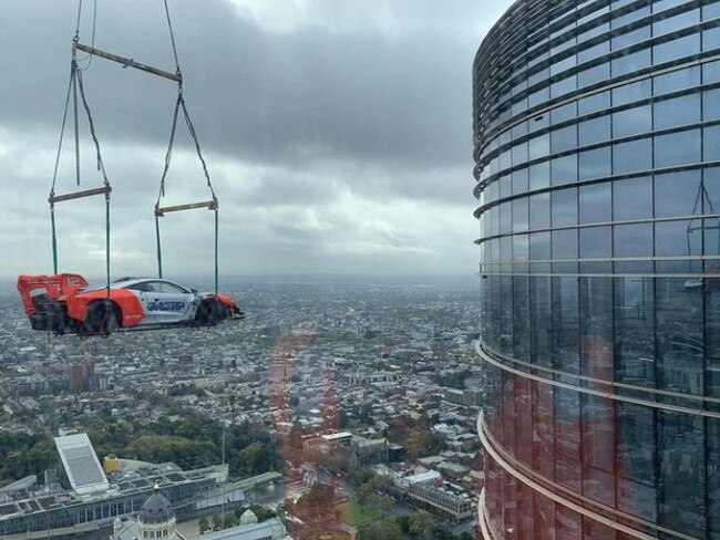 Portelli's McLaren Senna GTR is hoisted into his 57th floor penthouse apartment. Picture: Instagram