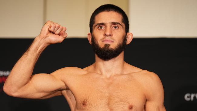 ABU DHABI, UNITED ARAB EMIRATES - OCTOBER 21: Islam Makhachev of Russia poses on the scale during the UFC 280 official weigh-in at Crowne Plaza Yas Island on October 21, 2022 in Abu Dhabi, United Arab Emirates. (Photo by Chris Unger/Zuffa LLC)